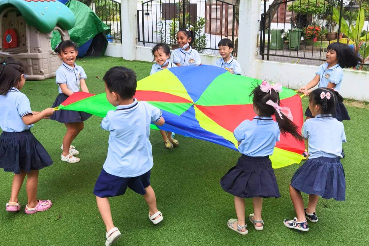 Children enjoying outdoor activities - Starshine Montessori