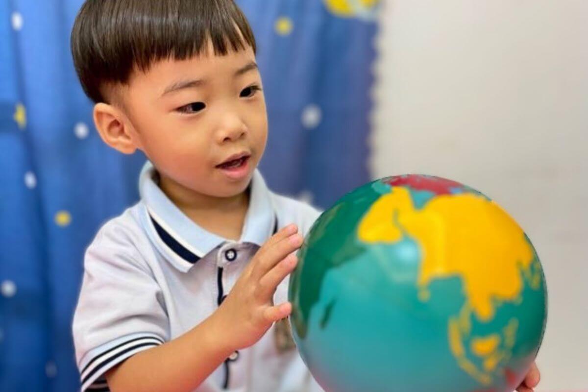 Curious Child Exploring a Globe Discovering Geography and Cultures