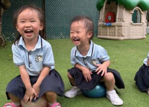 Happy children enjoying outdoor play during a fun preschool activity, promoting physical development and joyful learning at Starshine Montessori.