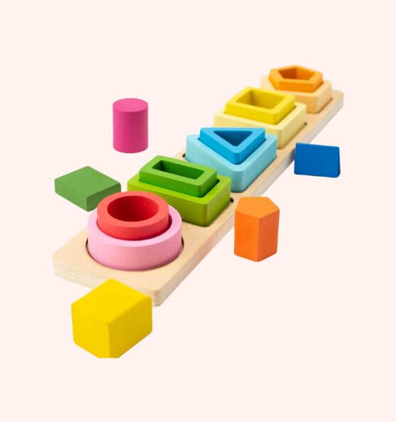 Colorful Montessori wooden geometric shape sorter toy with various shapes like circles, triangles, squares, and pentagons for early learning and cognitive development.